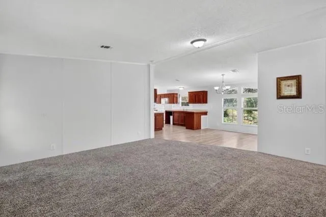 a view of kitchen and a window
