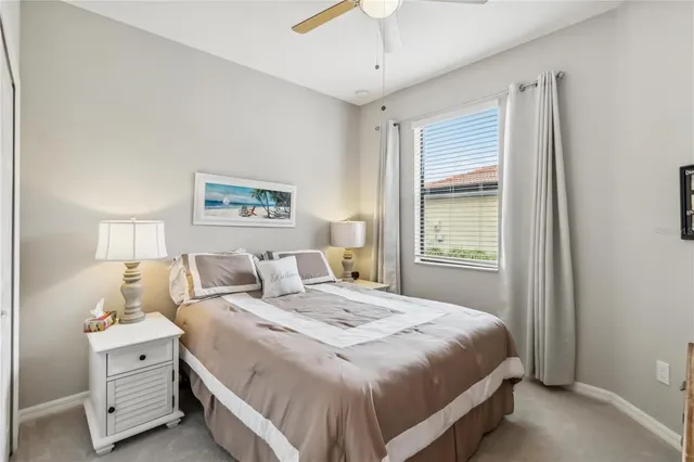 a view of a house with backyard and porch