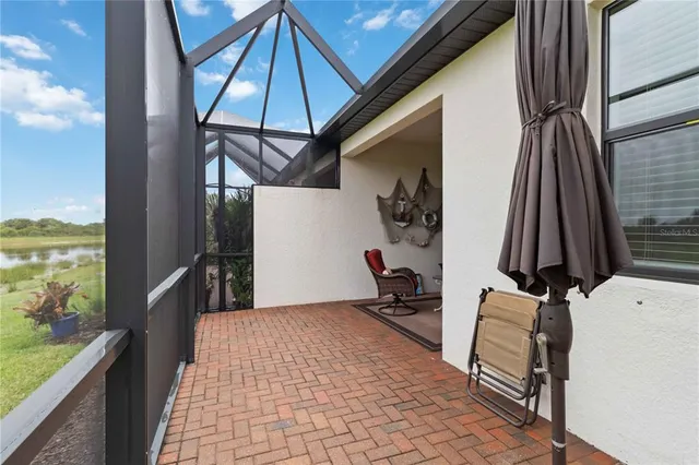 a aerial view of a house with a lake view