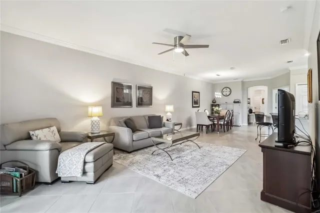 a view of a dining room and kitchen with furniture and window