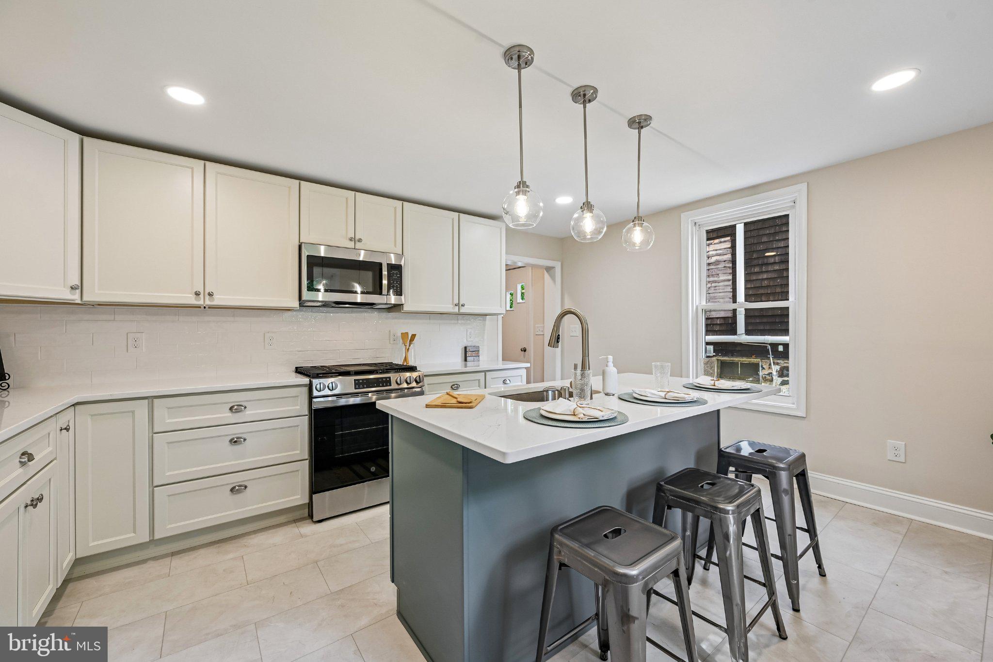 5714 Rusk Avenue Baltimore, MD 21215 - Photo 14 of 51 Modern kitchen with stylish finishes.