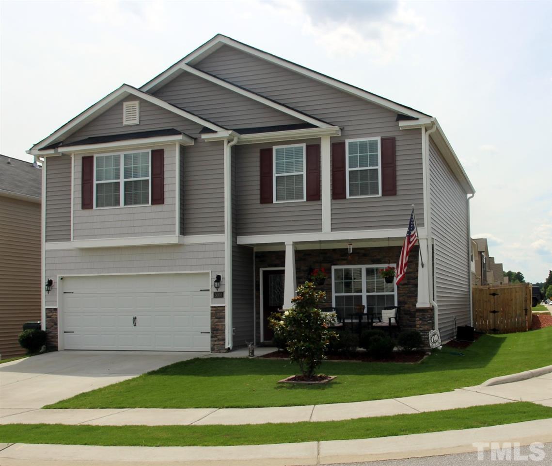 3600 Marble Ridge Lane Raleigh, NC 27610 - Photo 1 of 23 a front view of a house with a yard