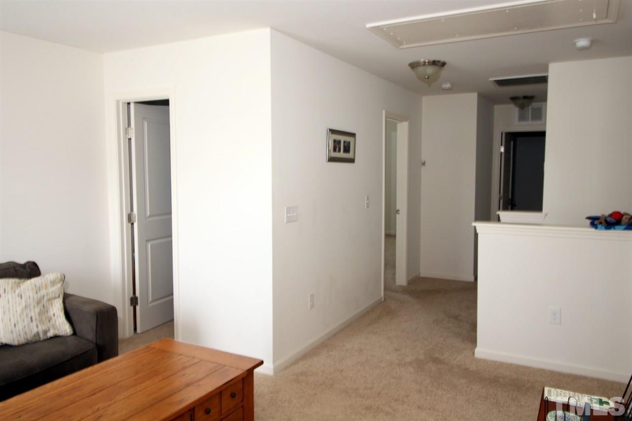 3600 Marble Ridge Lane Raleigh, NC 27610 - Photo 17 of 23 a bedroom with a bed and a furniture