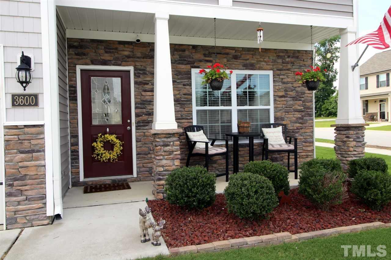 3600 Marble Ridge Lane Raleigh, NC 27610 - Photo 3 of 23 a front view of a house with garden