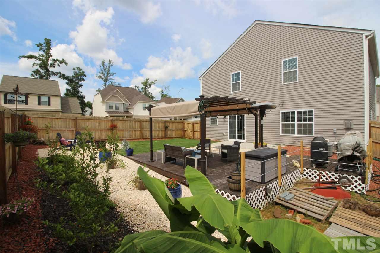 3600 Marble Ridge Lane Raleigh, NC 27610 - Photo 22 of 23 a view of a house with lounge chair