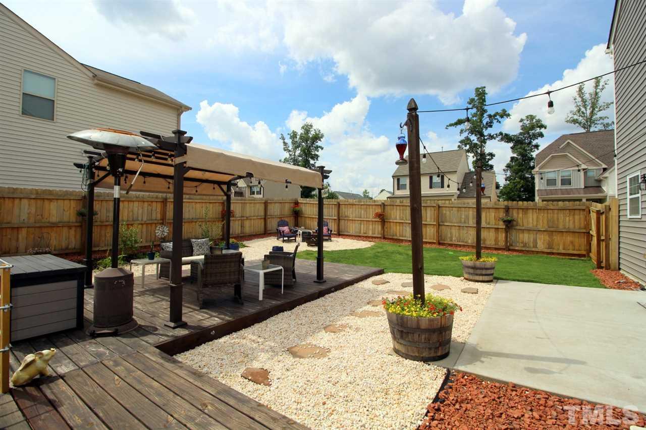 3600 Marble Ridge Lane Raleigh, NC 27610 - Photo 23 of 23 a view of a patio with couches and potted plants