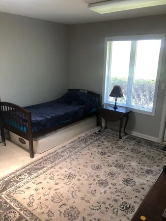 a living room with a couch and a table