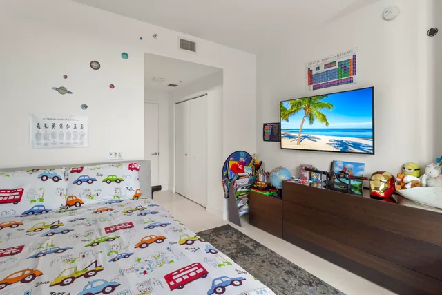 a room with toys and wooden floor