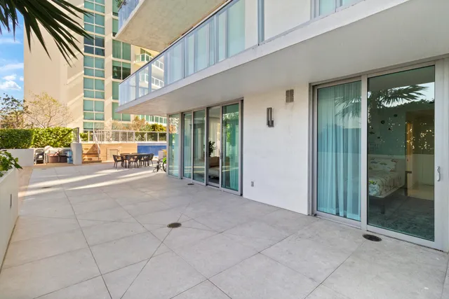 a outdoor space with patio the couches and a potted plant