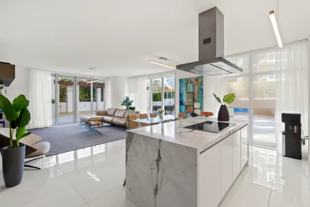 a kitchen with sink refrigerator and outdoor view