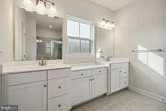 an empty room with wooden floor and closet