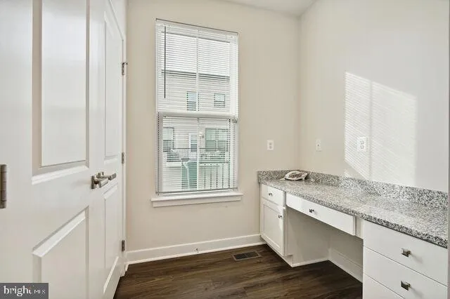 a swimming pool with outdoor seating and yard