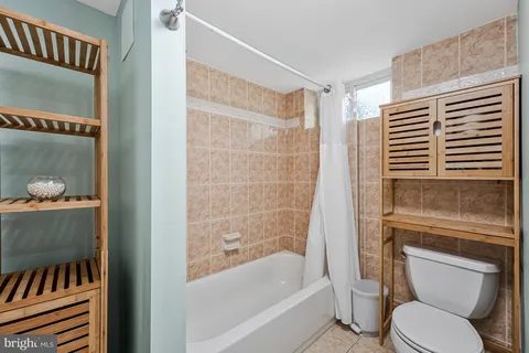 a kitchen with a sink a stove and refrigerator