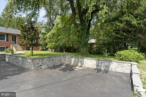 a view of a balcony with wooden floor