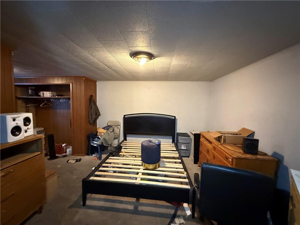 204 McCoy Road McKees Rocks, PA 15136 - Photo 11 of 25 a living room with furniture and a flat screen tv