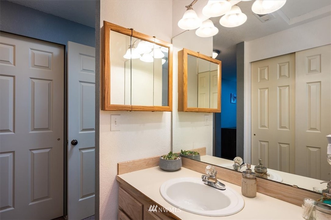 2351 Michigan Street Bellingham, WA 98229 - Photo 19 of 27 a bathroom with a sink and a mirror