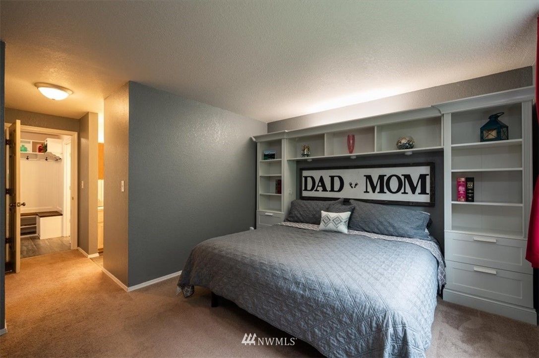 2351 Michigan Street Bellingham, WA 98229 - Photo 22 of 27 a bedroom with a bed and a walk in closet