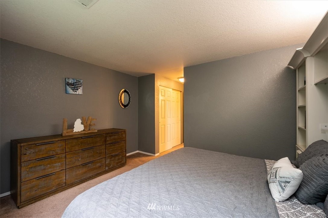 2351 Michigan Street Bellingham, WA 98229 - Photo 23 of 27 a bedroom with a bed and a dresser