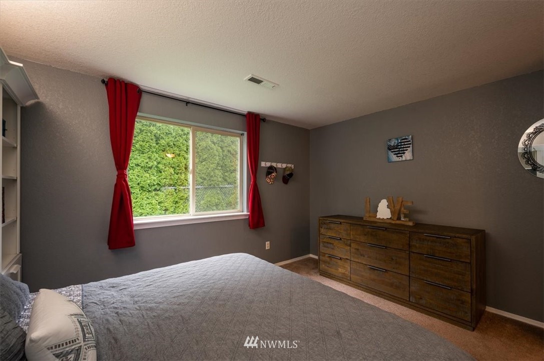 2351 Michigan Street Bellingham, WA 98229 - Photo 24 of 27 a bedroom with a bed and a window