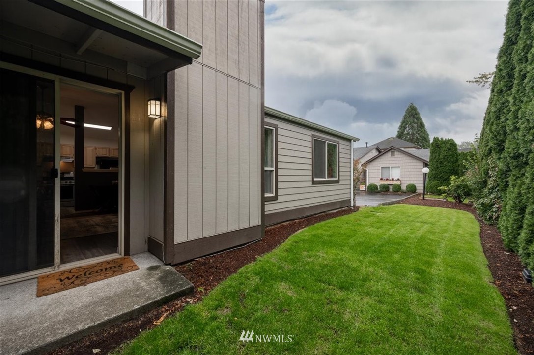 2351 Michigan Street Bellingham, WA 98229 - Photo 26 of 27 a view of house with backyard and glass door