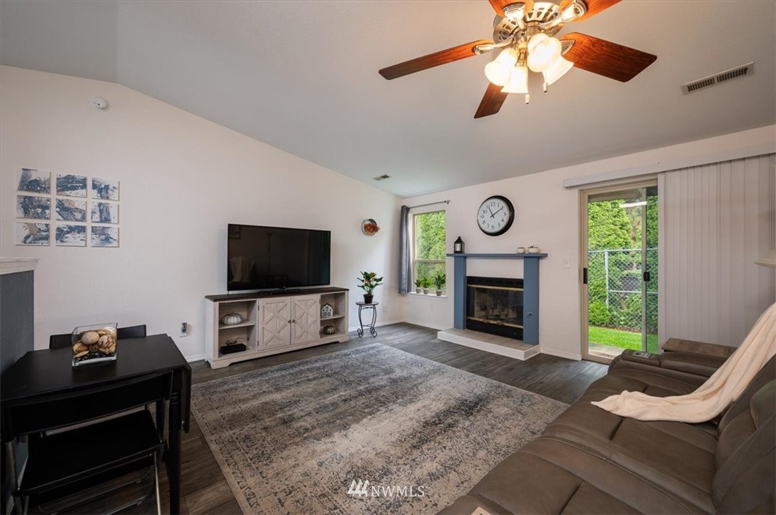 2351 Michigan Street Bellingham, WA 98229 - Photo 4 of 27 a living room with furniture and a fireplace