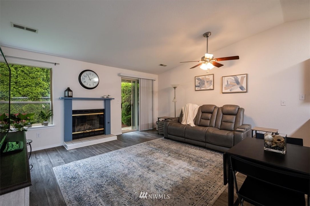2351 Michigan Street Bellingham, WA 98229 - Photo 5 of 27 a living room with furniture a fireplace and window