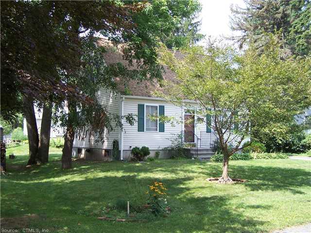 16 Edmond Street Putnam, CT 06260 - Photo 1 of 1 front view of a house with a yard