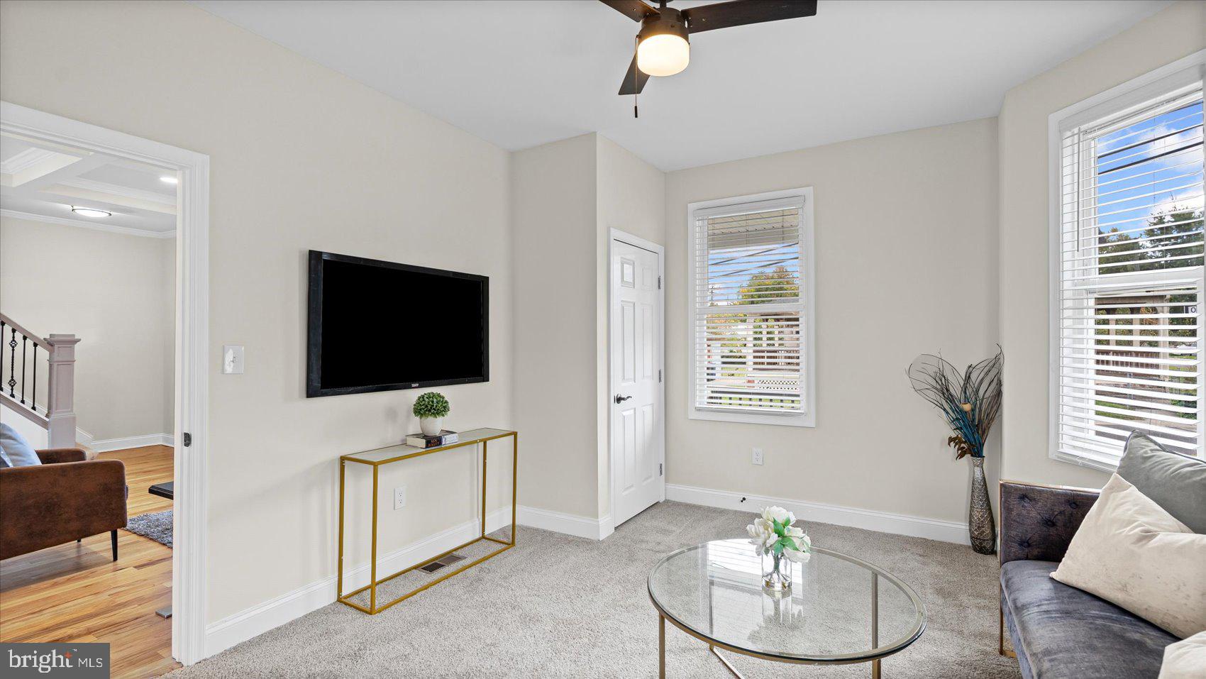 5300 Greenhill Avenue Baltimore, MD 21206 - Photo 13 of 43 a living room with furniture and a flat screen tv