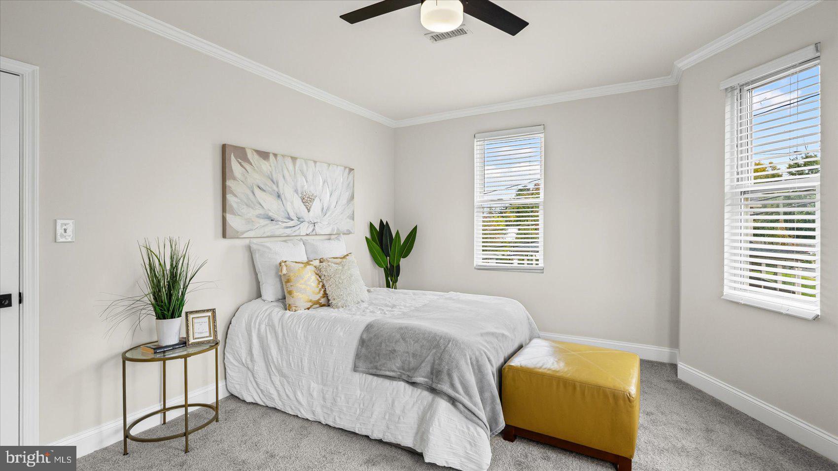 5300 Greenhill Avenue Baltimore, MD 21206 - Photo 16 of 43 a bedroom with a bed and painting on the wall