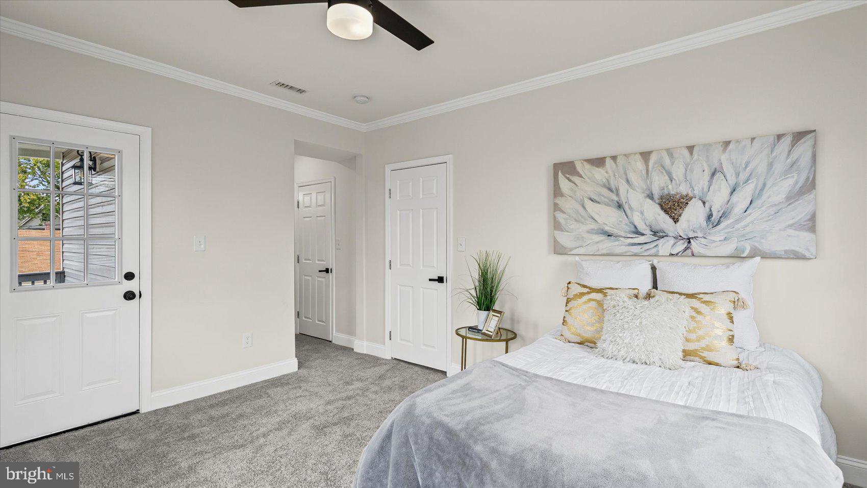 5300 Greenhill Avenue Baltimore, MD 21206 - Photo 18 of 43 a bedroom with a bed and a painting on the wall