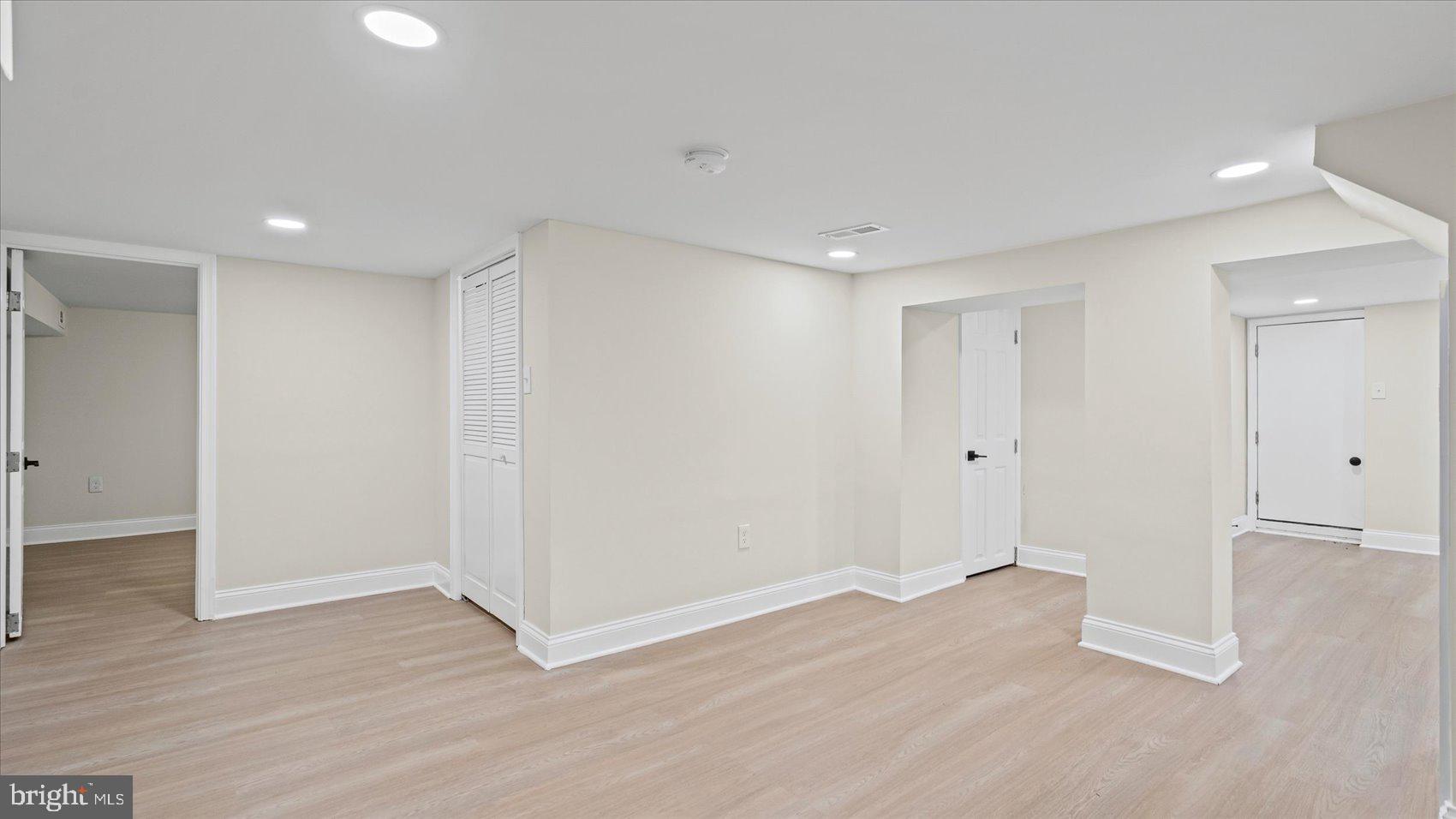 5300 Greenhill Avenue Baltimore, MD 21206 - Photo 23 of 43 a view of an empty room with wooden floor