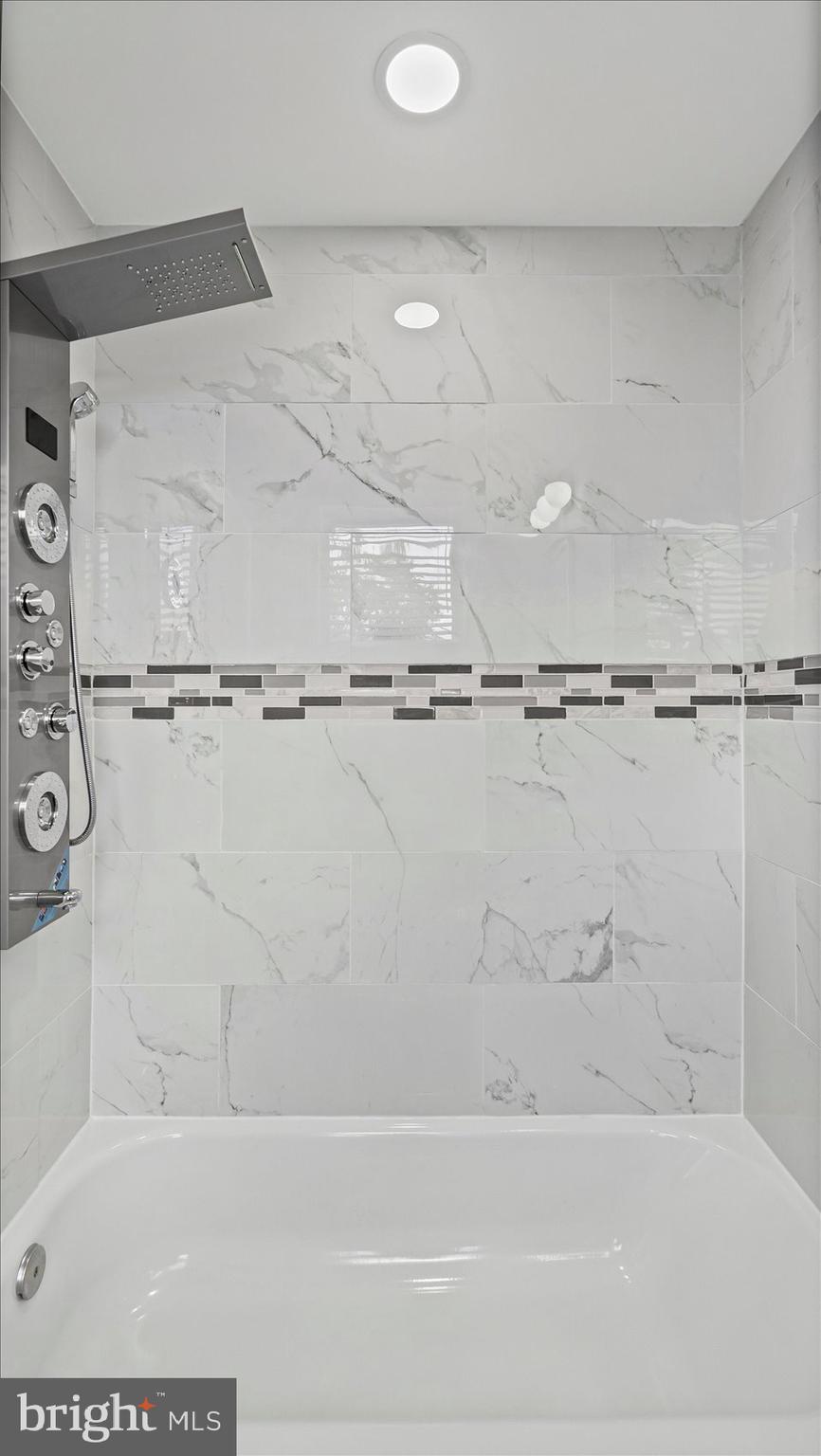 5300 Greenhill Avenue Baltimore, MD 21206 - Photo 32 of 43 a bathroom with a shower
