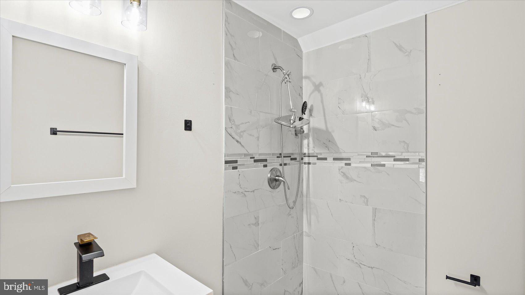 5300 Greenhill Avenue Baltimore, MD 21206 - Photo 36 of 43 a bathroom with a shower