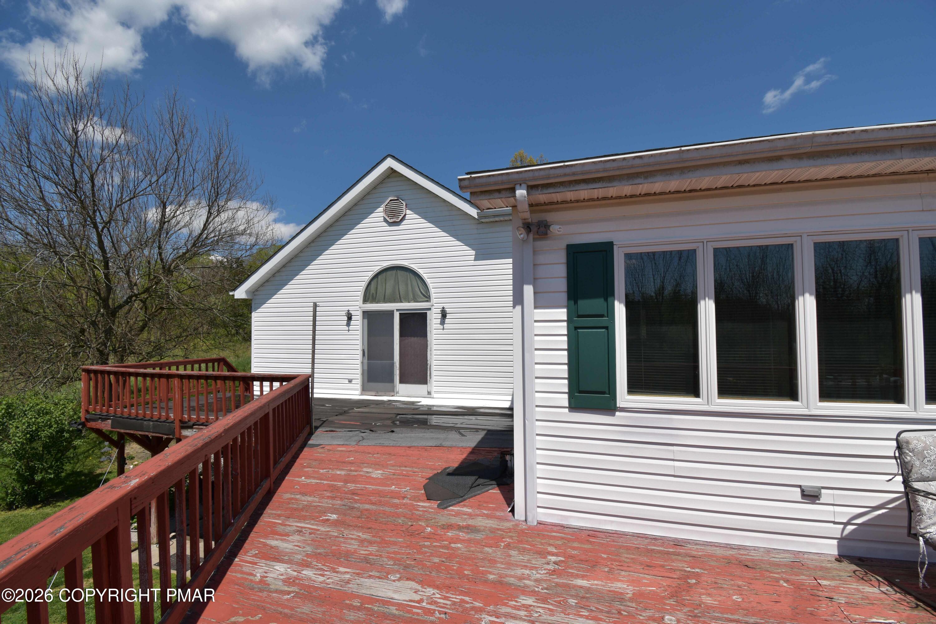 160 Quiet Valley Road Mount Bethel, PA 18343 - Photo 11 of 44 a view of a house with wooden fence