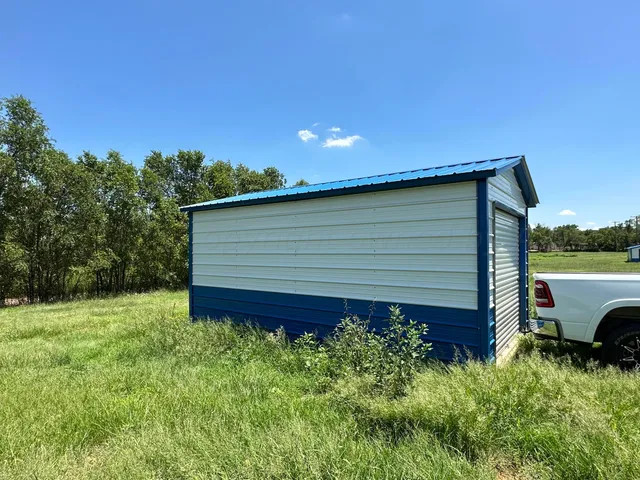a view of a backyard with a garden