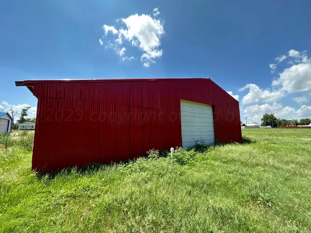 a view of a garden from a balcony