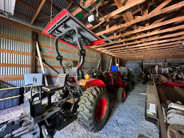 a backyard of a house with lots of green space and plants