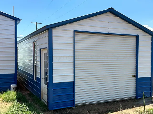 a view of wooden house with a small yard