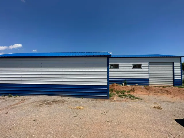 a view of a house with a small yard