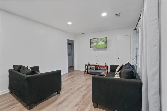 a living room with furniture and a couch