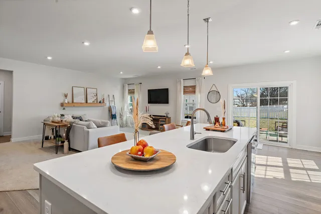 a kitchen with a table and chairs