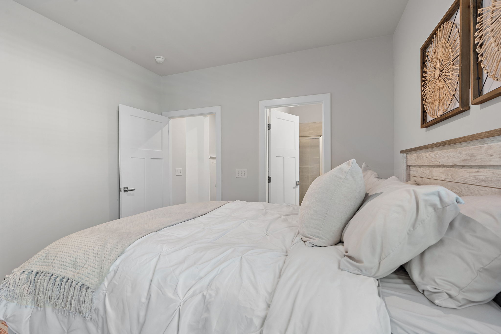 406 Ryan Avenue Gallatin, TN 37066 - Photo 21 of 45 a bedroom with a bed and painting on the wall