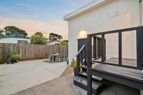 a view of chairs and tables in patio