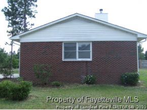 279 Sawyer Road Cameron, NC 28326 - Photo 13 of 13 a view of a house with a garden