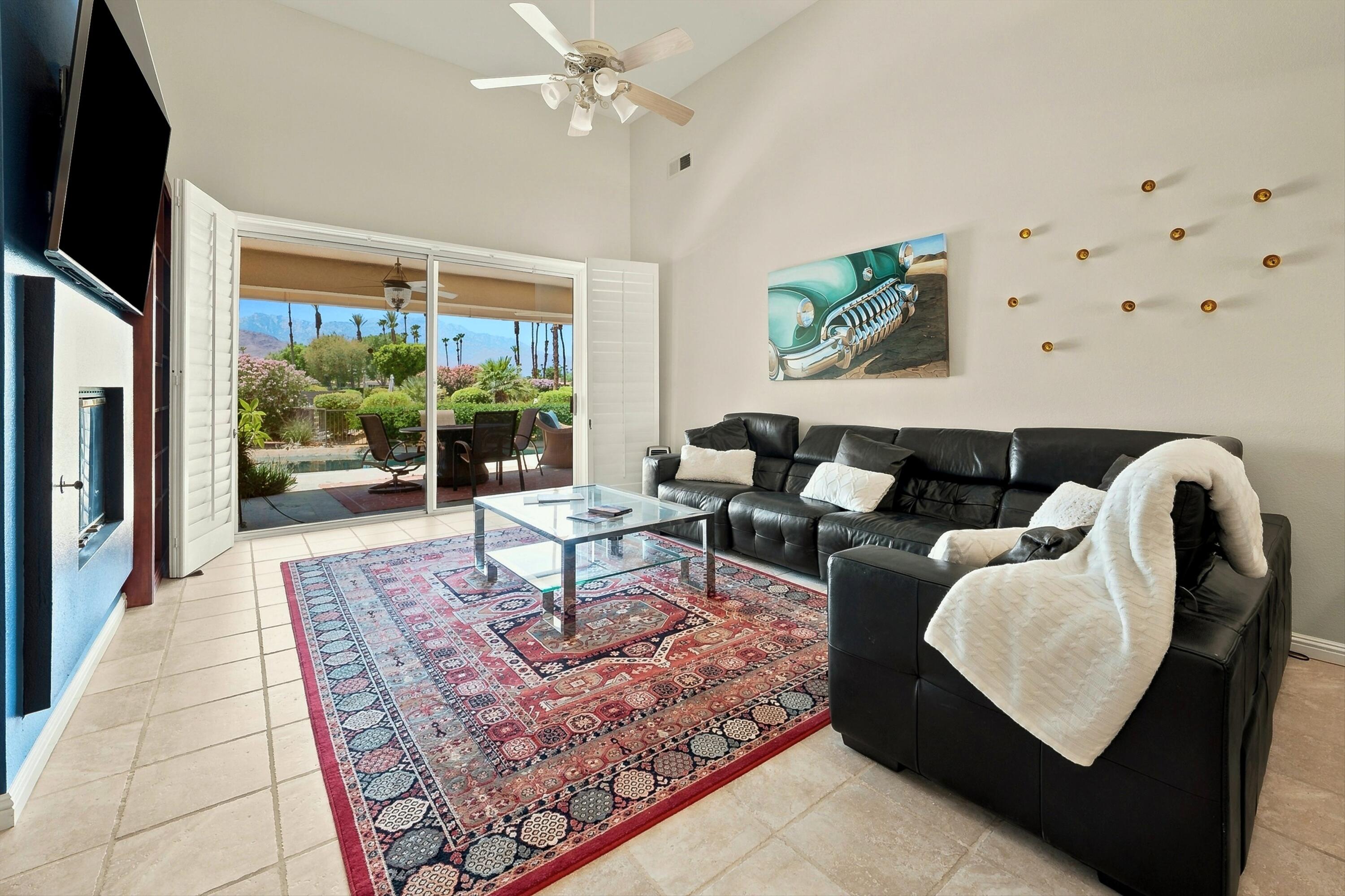 138 Lakeshore Drive Rancho Mirage, CA 92270 - Photo 11 of 30 a living room with furniture and a large window