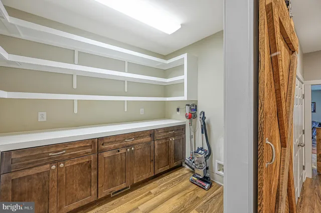 a view of a house with backyard porch and garden