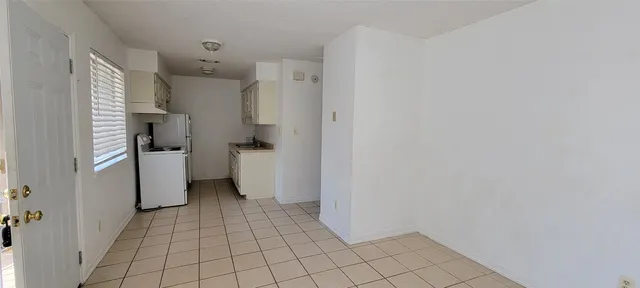 a view of a storage & utility room with washer and dryer