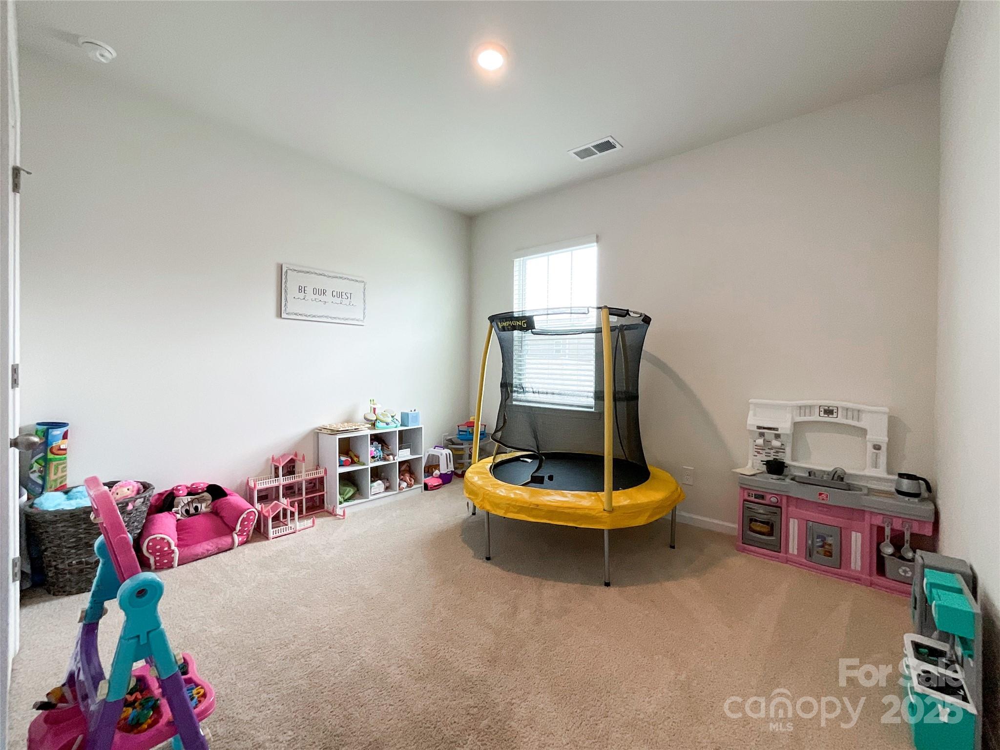 2159 Vanderlyn Street Monroe, NC 28112 - Photo 15 of 44 a living room with furniture and a wooden floor