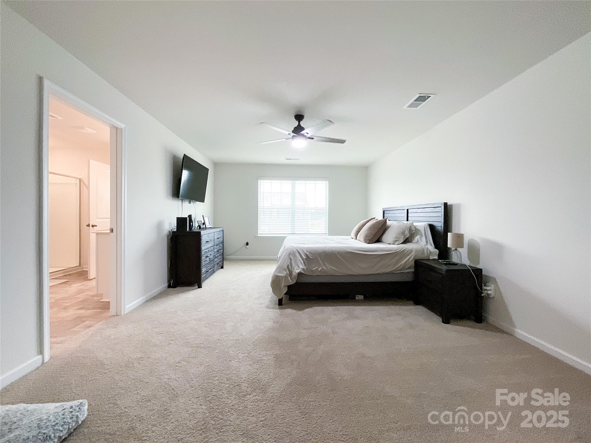 2159 Vanderlyn Street Monroe, NC 28112 - Photo 20 of 44 a living room with furniture and a flat screen tv
