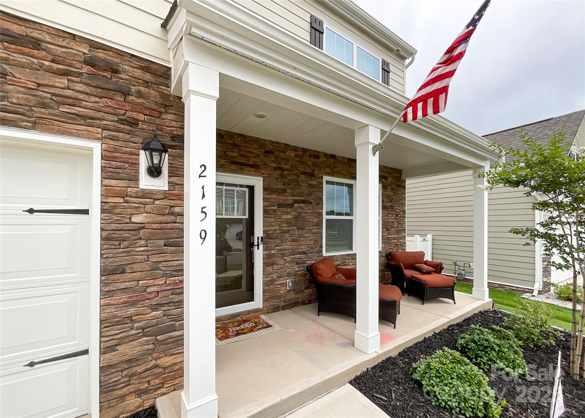2159 Vanderlyn Street Monroe, NC 28112 - Photo 2 of 44 a view of a patio with chair and tables